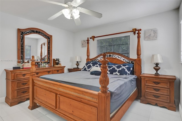 tiled bedroom with ceiling fan