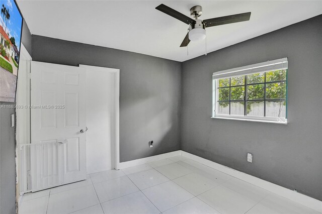 8925 SW 11th St, Miami, FL 33174 - unfurnished bedroom with tile patterned flooring and a ceiling fan