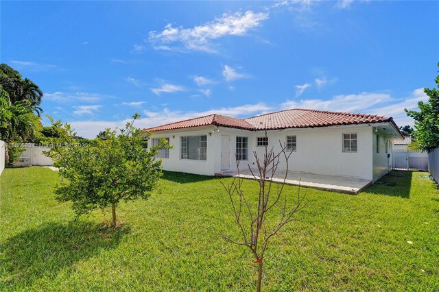 8925 SW 11th St, Miami, FL 33174 - rear view of property with stucco siding, a tile roof, and a patio