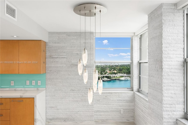 bathroom featuring a water view