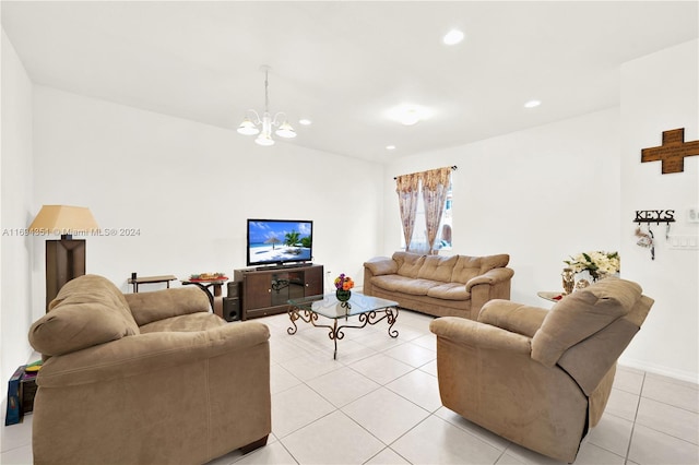 living room featuring light tile patterned flooring and an inviting chandelier