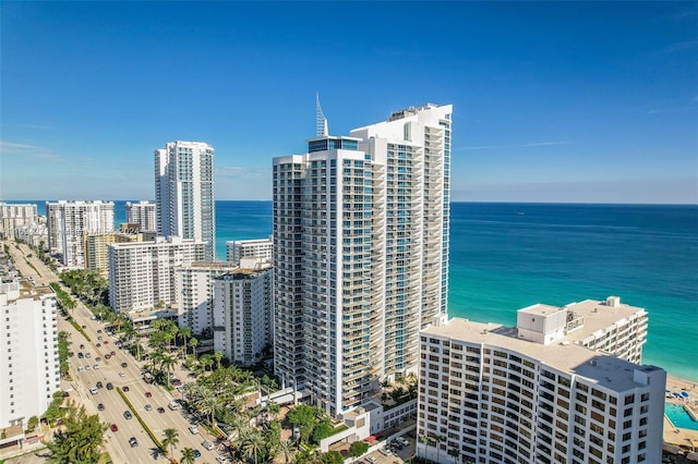 drone / aerial view with a view of the beach and a water view