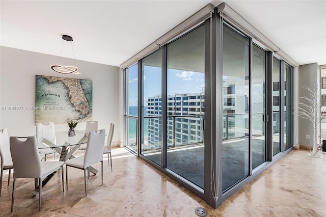 interior space featuring a wall of windows