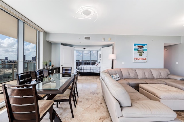 living room featuring plenty of natural light