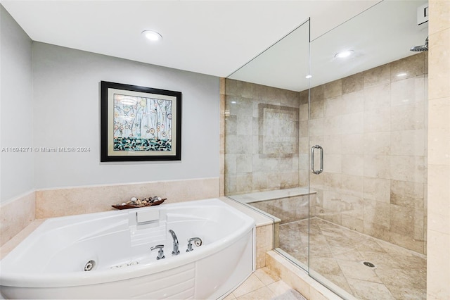 bathroom featuring tile patterned flooring and plus walk in shower