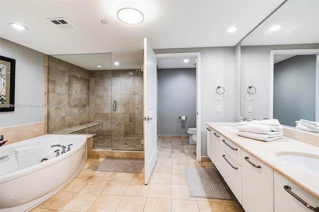 full bathroom with tile patterned floors, vanity, toilet, and plus walk in shower