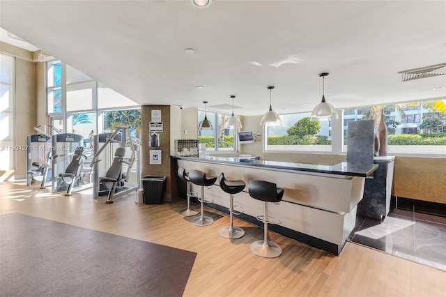 kitchen featuring pendant lighting and hardwood / wood-style flooring