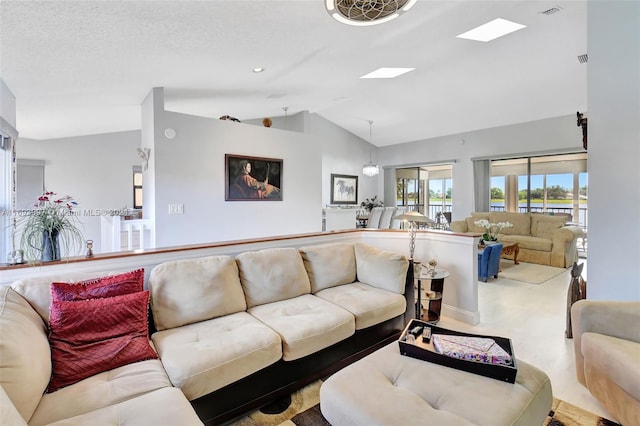 carpeted living room featuring a textured ceiling and lofted ceiling