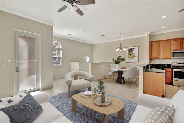 living room featuring light tile patterned floors, ceiling fan with notable chandelier, crown molding, and sink