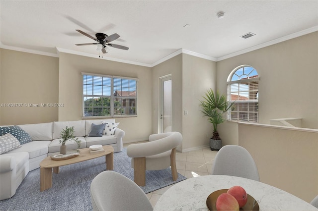 tiled living room with crown molding and ceiling fan