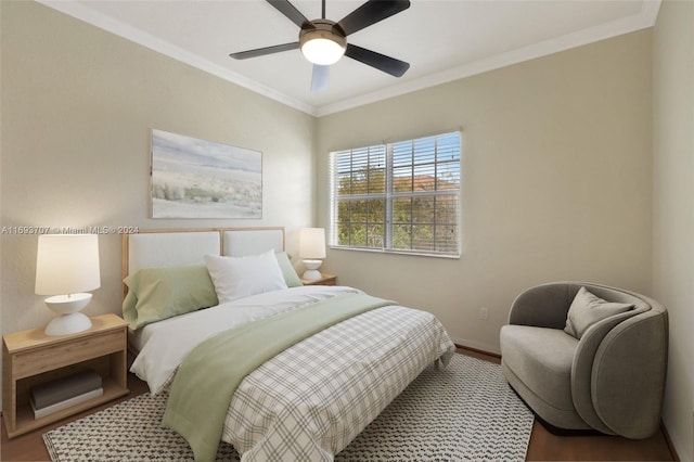 bedroom with ceiling fan, ornamental molding, and hardwood / wood-style flooring