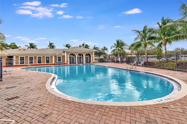 view of pool featuring a patio