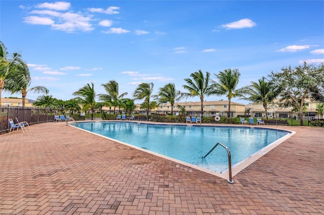 view of swimming pool with a patio area