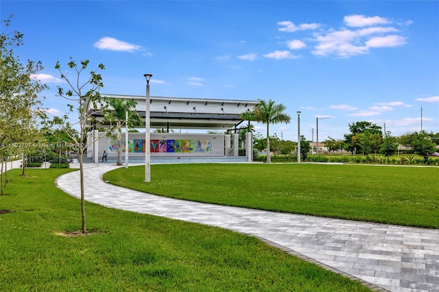 view of home's community featuring a yard