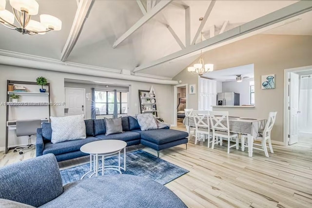 living room with hardwood / wood-style flooring, vaulted ceiling with beams, and ceiling fan with notable chandelier