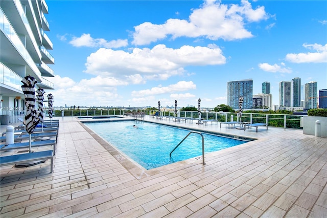 view of pool featuring a patio area