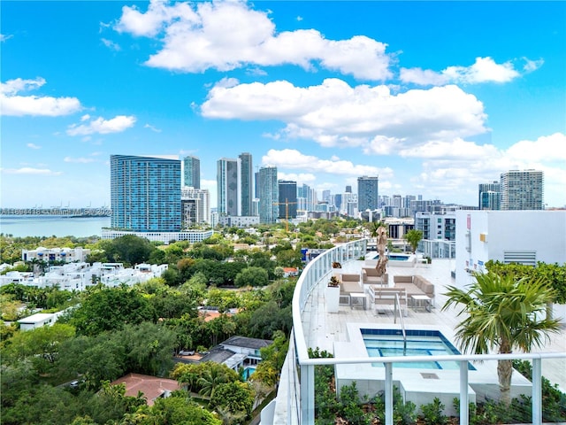 birds eye view of property featuring a water view