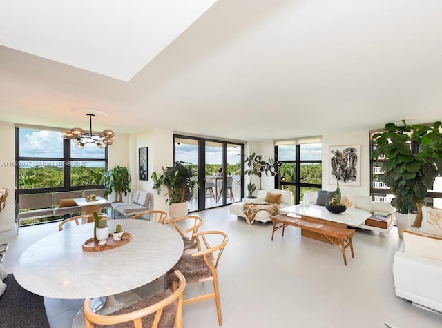 1121 Crandon Blvd Unit D402, Key Biscayne, FL 33149 - dining room featuring floor to ceiling windows, healthy amount of natural light, and a chandelier