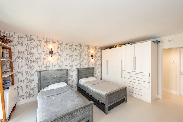 1121 Crandon Blvd Unit D402, Key Biscayne, FL 33149 - bedroom featuring wallpapered walls and an accent wall