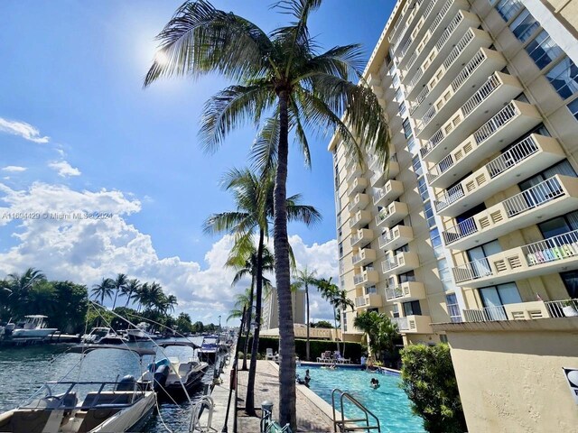 view of pool with a water view