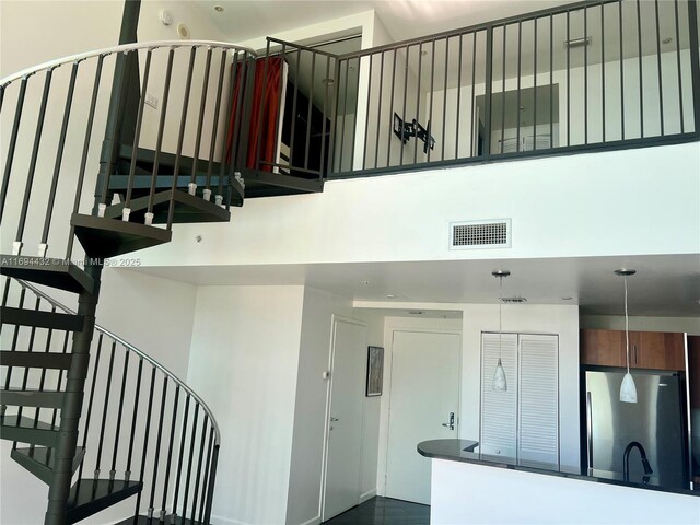 300 S Biscayne Blvd Unit 826, Miami, FL 33131 - stairway with a towering ceiling