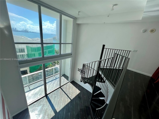 300 S Biscayne Blvd Unit 826, Miami, FL 33131 - stairway with a water view and wood finished floors