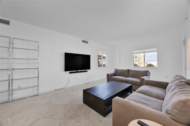 10 Aragon Ave Unit 810, Coral Gables, FL 33134 - living room featuring light tile patterned floors