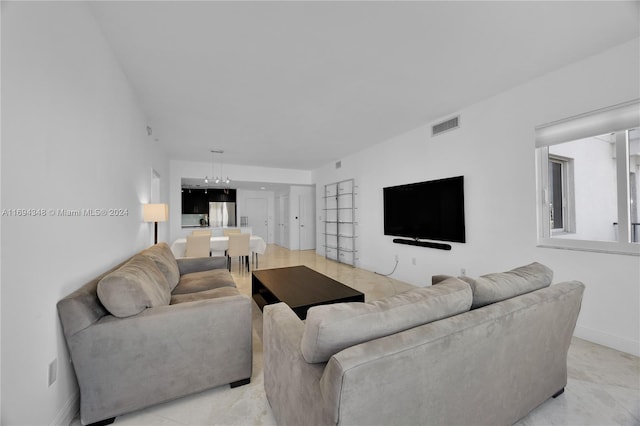 living room with light tile patterned floors