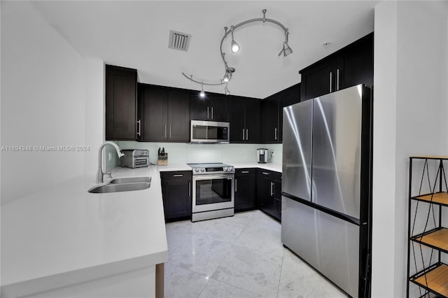 kitchen featuring sink and stainless steel appliances