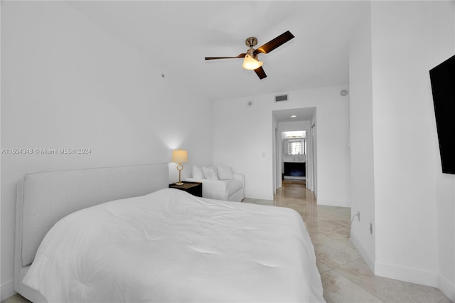 10 Aragon Ave Unit 810, Coral Gables, FL 33134 - bedroom featuring ceiling fan and baseboards