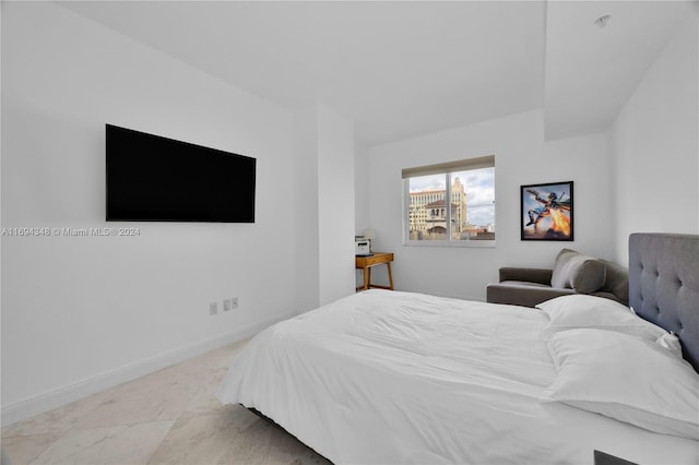 10 Aragon Ave Unit 810, Coral Gables, FL 33134 - bedroom featuring baseboards
