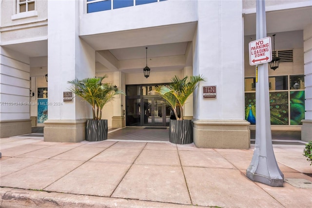 10 Aragon Ave Unit 810, Coral Gables, FL 33134 - entrance to property featuring stucco siding and french doors