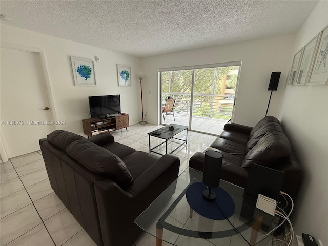 tiled living room with a textured ceiling