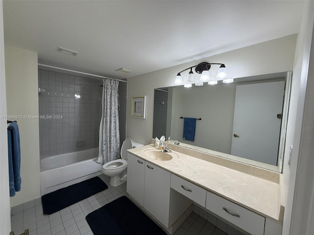 full bathroom with tile patterned floors, vanity, shower / bath combination with curtain, and toilet