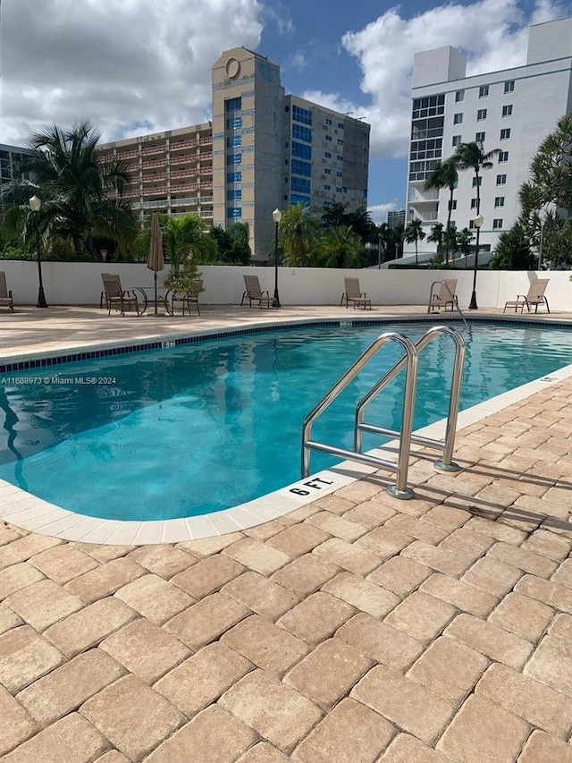 view of pool with a patio area