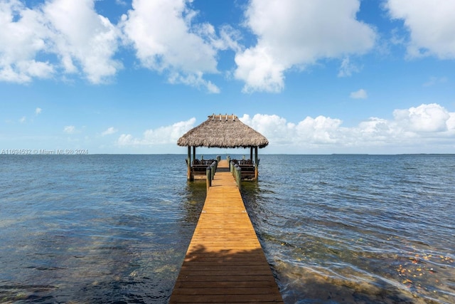 dock area featuring a gazebo and a water view