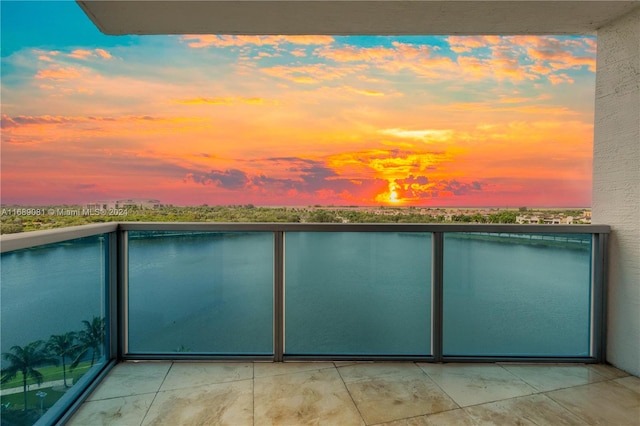 view of pool at dusk