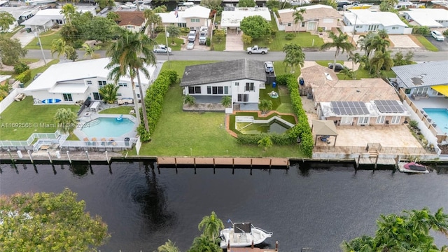 bird's eye view with a water view