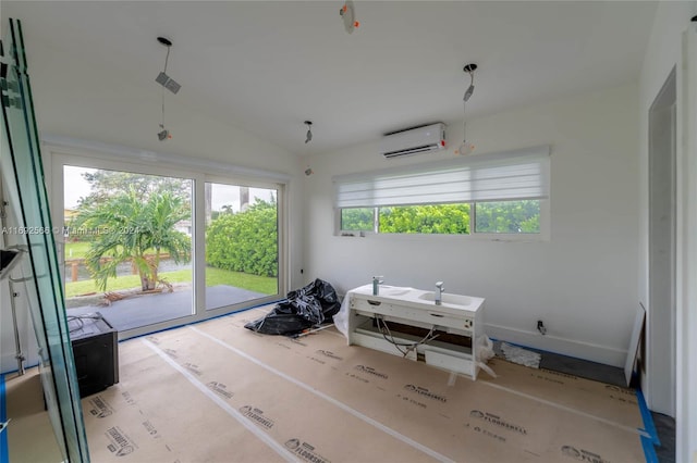 2537 Marathon Ln, Fort Lauderdale, FL 33312 - spare room with a wall unit AC and lofted ceiling
