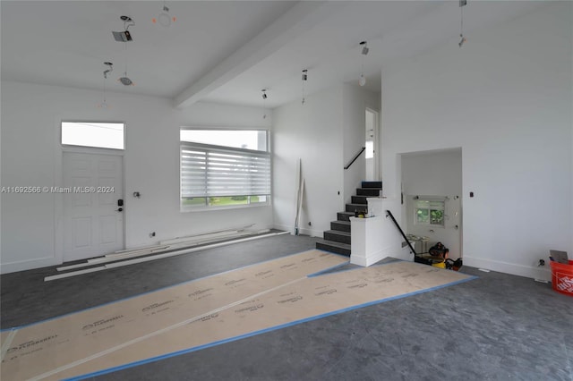 entryway with beam ceiling