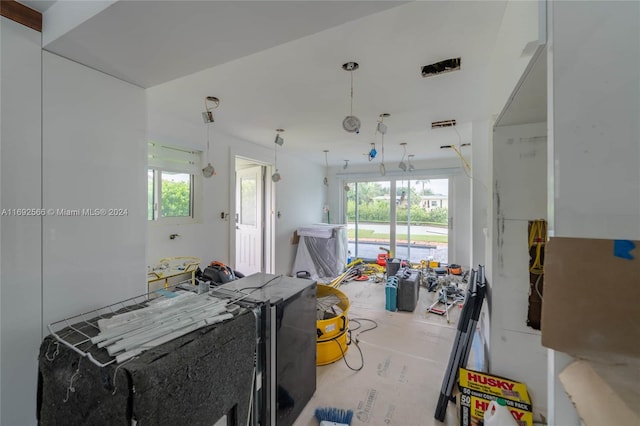 kitchen with pendant lighting and a wealth of natural light