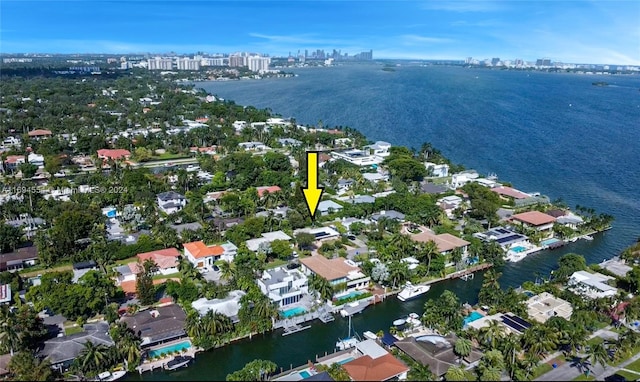 birds eye view of property featuring a water view