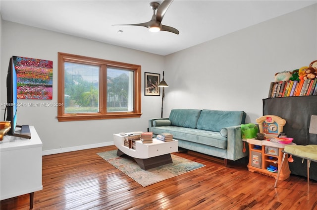 interior space featuring hardwood / wood-style floors and ceiling fan