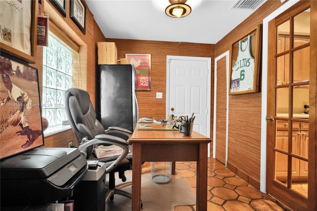 home office with wooden walls