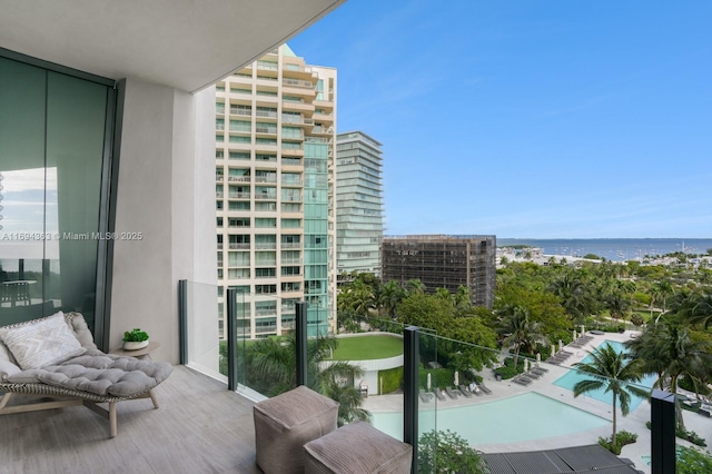 balcony featuring a water view