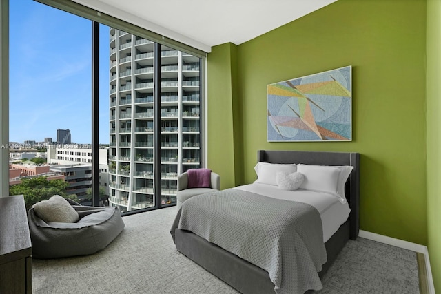 bedroom with floor to ceiling windows