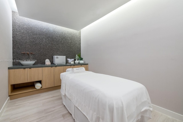 bedroom featuring light wood-type flooring