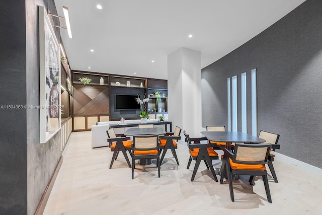 dining space featuring built in shelves