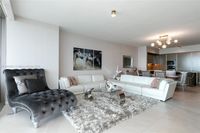 living room featuring a notable chandelier