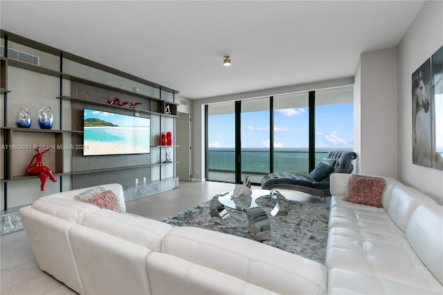 living room with floor to ceiling windows